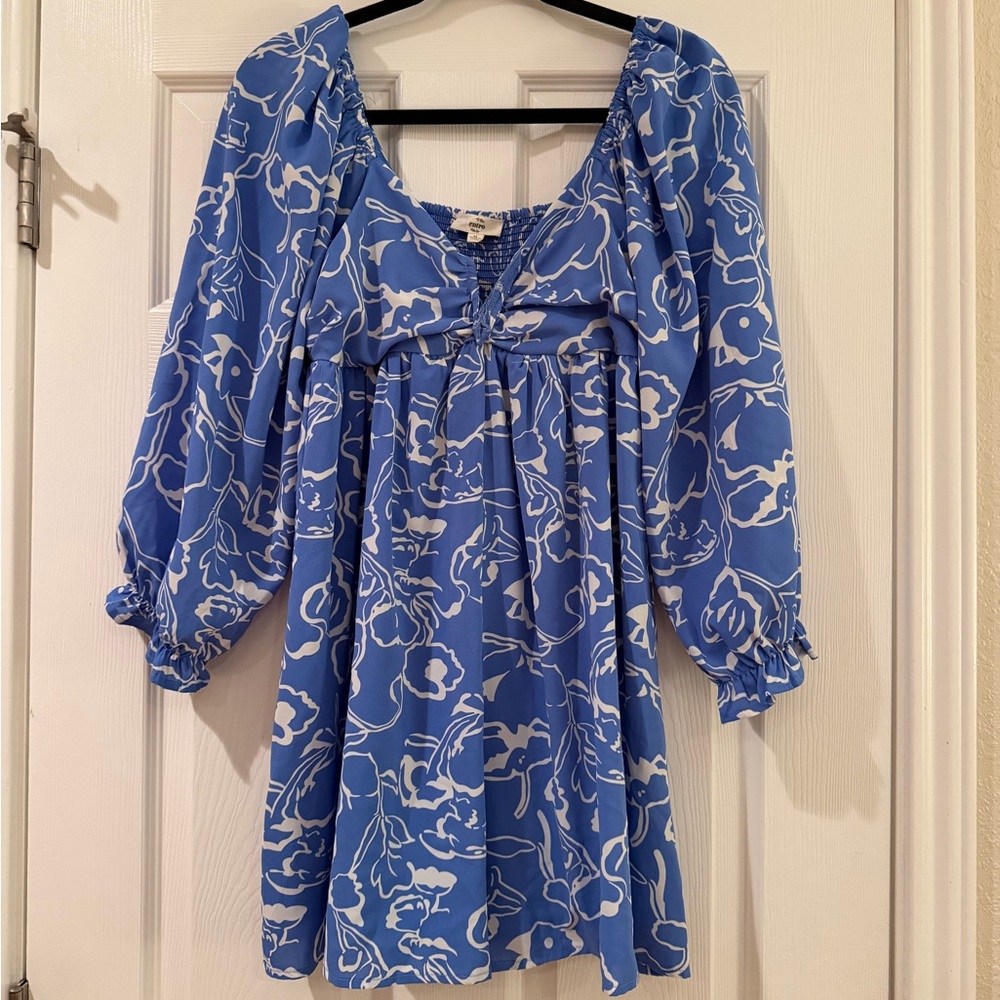 Blue Floral Romper with White Accents
